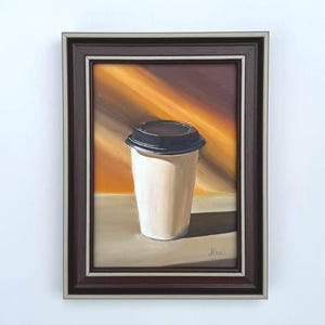 A cozy cup of coffee that reminds us of autumn, painted with oil paints