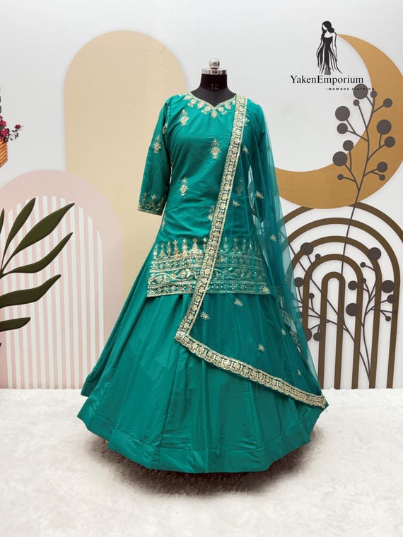 teal and gold indian dress TURQUOISE HEAVY EMBROIDERED INDIAN WEDDING SLIT STYLE GOWN main image 0
