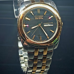 May include: A set of three ceramic mugs with a speckled, matte finish. The mugs are in shades of cream, light gray, and dark gray. Each mug has a simple, minimalist design, perfect for coffee or tea.