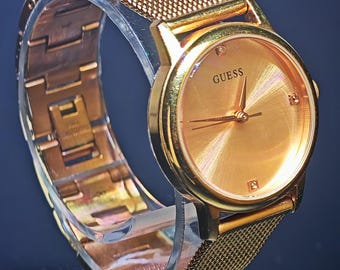 Guess Rose Gold Minimalist Watch  Radiant Sheen Mesh Bracelet Statement Piece