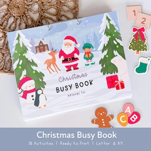 May include: A spiral-bound Christmas busy book featuring a winter scene with Santa Claus, an elf, a reindeer, a snowman, a penguin, and a polar bear. The cover text reads Christmas BUSY BOOK belongs to. Includes cut-out shapes of a tree, stocking, gingerbread man, and letters.