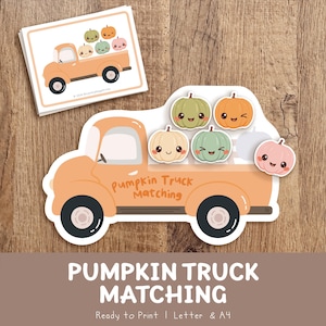 Puede incluir: Un juego de asociación pumpkin truck matching que presenta una ilustración de un camión color melocotón con el texto pumpkin truck matching. El set incluye un mazo de cartas y un recorte grande del camión cargado de calabazas pastel con caras.