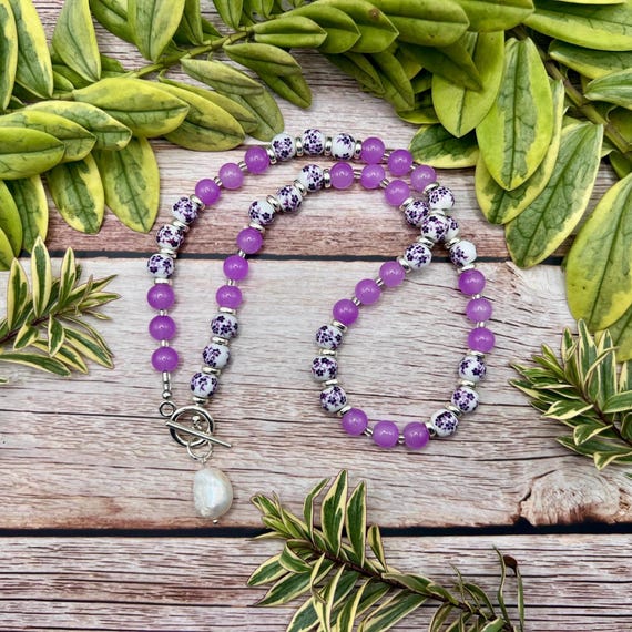 Purple Beaded Necklace with Patterned Ceramic Beads, Freshwater Pearl Pendant and Fabric Gift Bag