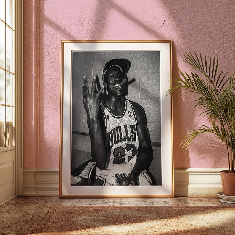 Mock-up of Michael Jordan wall art. Black and white poster for a vintage wall decor style. Perfect for bedroom decor, dorm room decor or decor in any part of your home. Print, frame and enjoy!