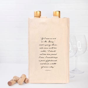 May include: A beige wine bottle tote bag with gold bottle tops and a quote from Pride and Prejudice. The quote reads, "If I were as rich as Mr. Darcy... I would keep a pack of foxhounds, and drink a bottle of wine a day."