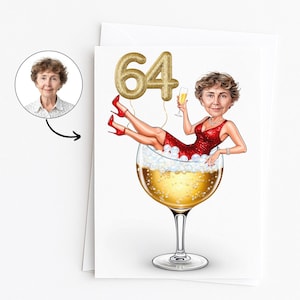Puede incluir: Tarjeta de cumpleaños con una ilustración de dibujos animados de una mujer con un vestido rojo y tacones, relajándose en una copa de vino gigante llena de champán. Un globo dorado con el número "64" flota encima. Una foto de la mujer está en un círculo.