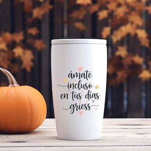 May include: A set of three ceramic mugs with a speckled, matte finish. The mugs are in shades of cream, light gray, and dark gray. Each mug has a simple, minimalist design and a rounded handle. The mugs are stacked on top of each other.