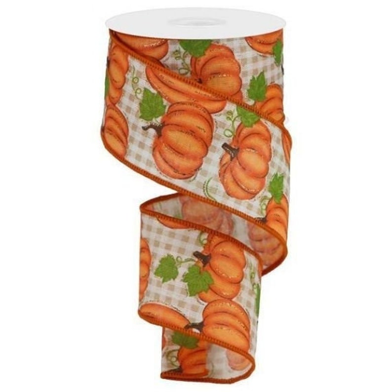 May include: A roll of 2.5 inch wide orange and white ribbon with a gingham pattern and a printed design of orange pumpkins with green leaves.