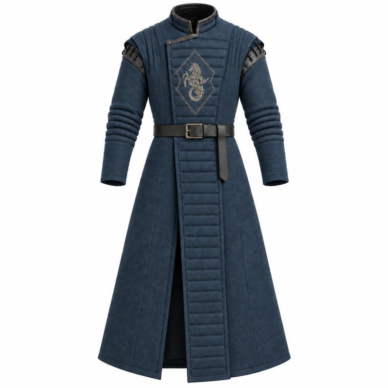 May include: A long, dark blue quilted coat featuring a high collar, long sleeves with ribbed detailing, and a black belt at the waist. The chest displays a diamond-shaped patch with an embroidered silver seahorse emblem, and the coat has a front opening.