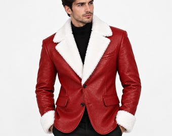 May include: A red leather blazer featuring a wide white faux fur lapel and white faux fur cuffs. The jacket has two black buttons on the front closure and two side pockets. It is worn over a black turtleneck sweater, creating a sharp contrast.