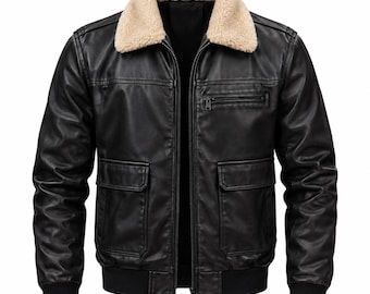 May include: A black jacket featuring a beige faux-shearling collar, a central zipper closure, two large flap pockets on the lower front, and one zippered chest pocket. The cuffs and hem are finished with a black ribbed knit material.