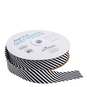 May include: A spool of single-fold quilt binding bias tape by Riley Blake Designs. The tape features a black and white diagonal striped pattern. The white label on the spool displays the text Single-Fold Quilt Binding, 2.5 inch bias tape, 50 yd spool, 100% cotton, 1/8 inch stripes, black, and the Riley Blake Designs logo.