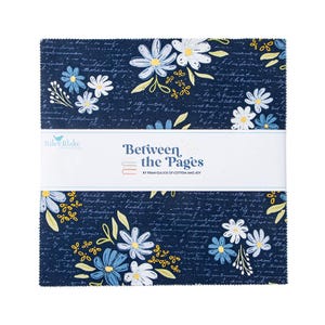 May include: A stack of fabric squares with a floral pattern in shades of blue, white, and yellow on a dark blue background. The fabric is wrapped with a white band that reads "Between the Pages" by Riley Blake Designs.
