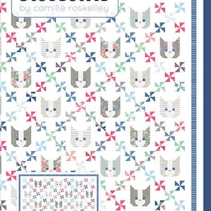 May include: A quilt pattern featuring a repeating design of cat faces and pinwheels in various colors. The text "thimble blossoms" and "KITTENS a darling 74" cat quilt" are visible. The quilt has a white background with a blue border.