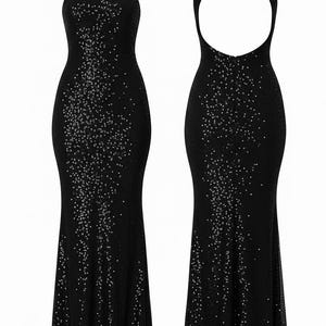 May include: Two views of a black sequined evening gown. The dress features a halter neckline and a fitted silhouette that flares out slightly at the hem. The back of the dress has a low, open design. The gown is covered in small, sparkling sequins.