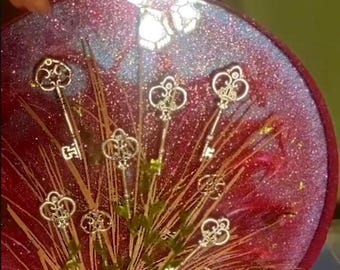 Handmade Epoxy Table featuring real pine needles and vintage-style skeleton keys