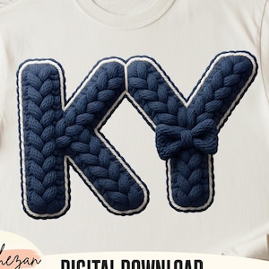 May include: White t-shirt with the letters "KY" in a navy blue knitted design and a white border. The letter "Y" has a navy blue bow. The words "DIGITAL DOWNLOAD" are printed in black.