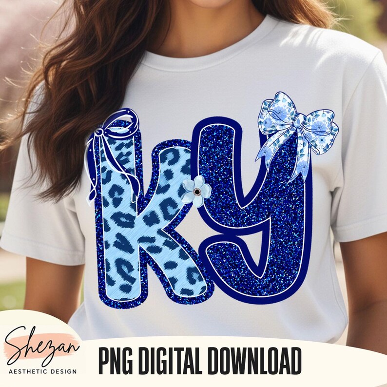 May include: White t-shirt featuring the letters "KY" in blue. The "K" has a light blue leopard print design, while the "Y" is a dark blue glitter. A blue floral bow and a small white flower accent the design. The text "PNG DIGITAL DOWNLOAD" is at the bottom.