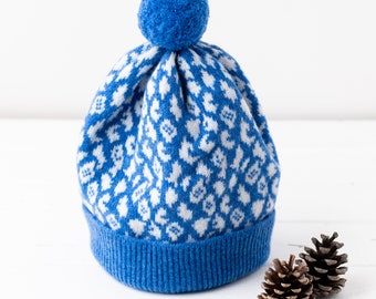 Leopard knitted pom pom hat - river blue and white
