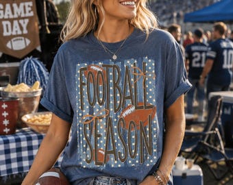 T-shirt graphique effet vieilli pour la saison de football, style vintage pour les jours de match.