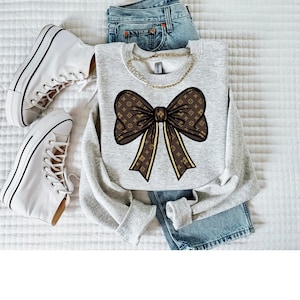 Camisa con lazo coqueta imagen 4
