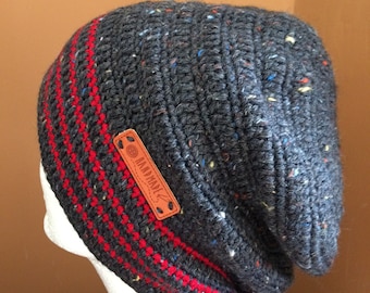 May include: Gray beanie with red stripes and a brown leather patch that says "Handmade".