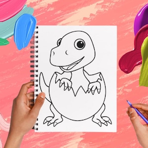 May include: A spiral-bound sketchbook with a black and white cartoon dinosaur hatching from an egg. The image is on a pink background with colorful paint strokes. A hand holds the sketchbook, and another hand holds a purple pen.