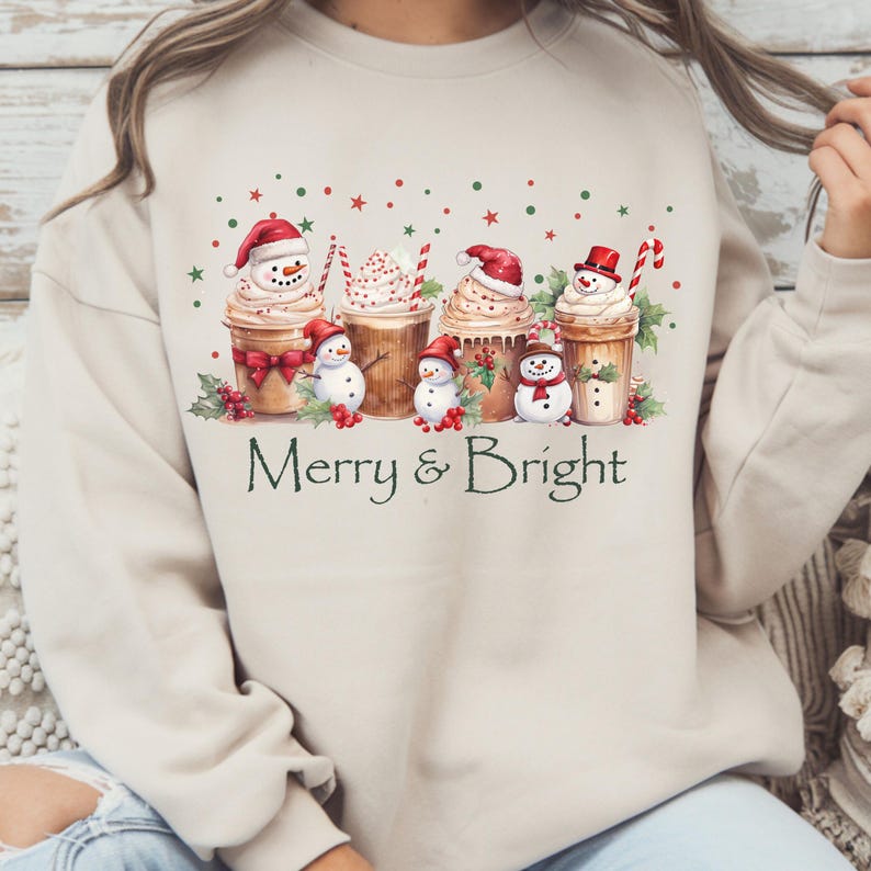 Winter Holiday Sweatshirt Christmas Coffee Design Festive Seasonal Apparel Merry Bright Theme Snowman Cup Illustration Whipped Cream Detail Candy Cane Accent Holly Berry Decoration Comfortable Cotton Blend Perfect Christmas Gift Holiday
