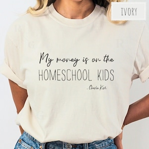 Stay-at-home mom shirt with humorous homeschool quote. Unique gift idea for homeschooling parents, teachers, and proud moms. Funny Homeschool Mama Gift My Money Is On the Homeschool Kids Charlie Kirk Shirt For Moms Stay At Home Mom Gift For Homeschooling Teacher