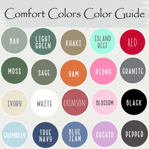 May include: A color guide titled "Comfort Colors Color Guide" displays a variety of colors in circular swatches. Colors include Bay, Light Green, Khaki, Island Reef, Red, Moss, Sage, Yam, Peony, Granite, Ivory, White, Crimson, Blossom, Black, Chambray, True Navy, Blue Jean, Orchid, and Pepper.