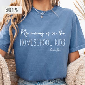 Homeschool mama shirt featuring playful saying, great gift for moms. Comfortable tee for homeschooling teachers or stay-at-home parents.