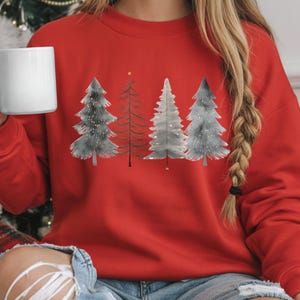 Minimalist holiday sweatshirt with watercolor trees, a cozy Christmas outfit for women, great as a gift for mom, best friend, or a warm crewneck for holiday office parties or any kind of gathering