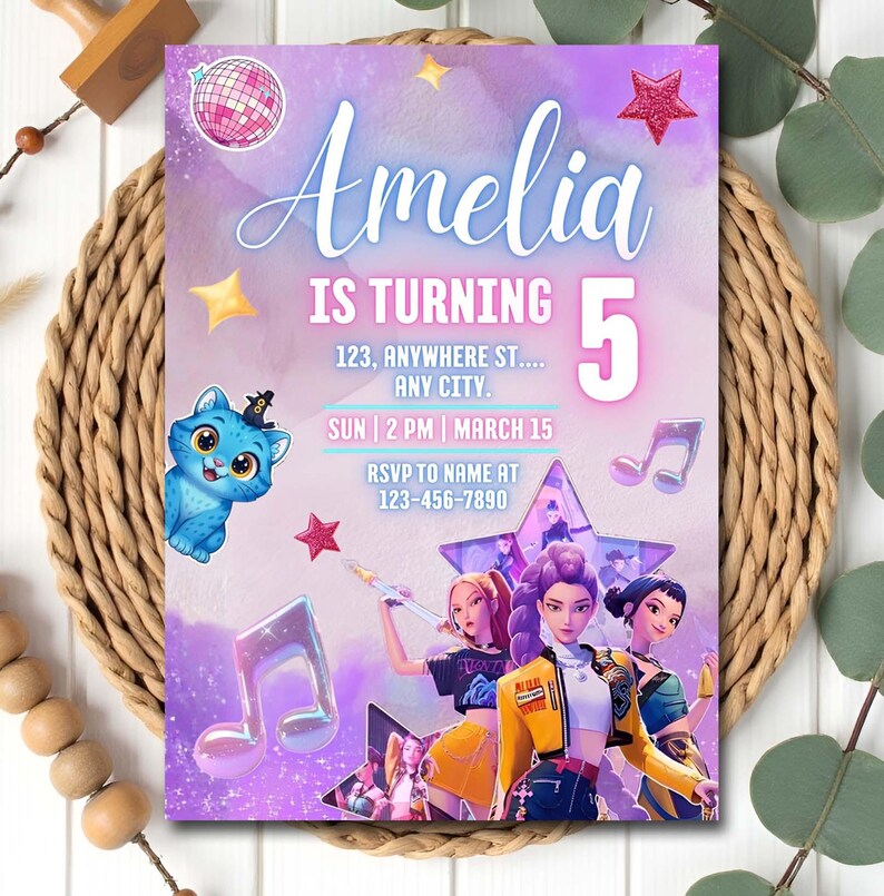 May include: A birthday party invitation with a purple and pink theme. The invitation says "Amelia is turning 5" and includes event details. A cartoon cat, musical notes, and stars decorate the invitation.