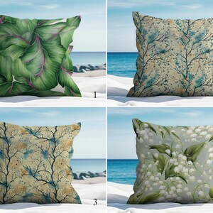 May include: Four decorative throw pillows with nature-inspired designs. One pillow features large green leaves with pink accents. Another has a blue and beige floral pattern. The third has a tree branch design. The last pillow has a white flower pattern.