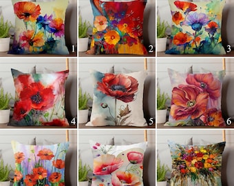 May include: Nine decorative throw pillows with floral designs. The pillows feature watercolor paintings of colorful flowers, including poppies, in various arrangements. The color palette includes red, orange, yellow, blue, and purple hues, creating a vibrant and artistic aesthetic.