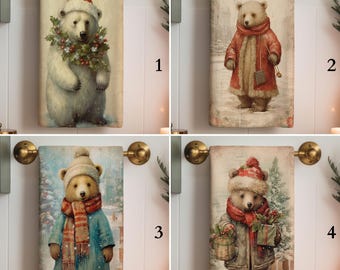 May include: Set of four decorative Christmas-themed hand towels. Each towel features a different bear illustration in winter attire. The bears are depicted in a variety of outfits, including coats, hats, and scarves, with festive details like wreaths and gifts.