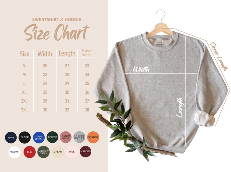 May include: A light gray sweatshirt hanging on a wooden hanger, with a size chart to the left. The chart lists sizes S to 3XL, with width, length, and sleeve length measurements in inches. Color swatches are at the bottom.