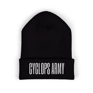 May include: A black beanie with the white text "CYCLOPS ARMY" across the front. The hat is a simple, classic design, suitable for cold weather. The text is in a bold, sans-serif font.