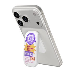 May include: A white phone grip with a purple and yellow design that reads "I AM YELLING, CARL! Mongo." The grip is attached to a silver smartphone. The design includes the text "PRINCESS POSSE" and "NO!!".