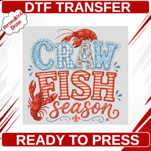 May include: A DTF transfer design featuring the text CRAW FISH season. The word CRAW is in blue gingham and floral patterns, FISH is in red and white stripes, and season is in red script. Two red crawfish illustrations are included.