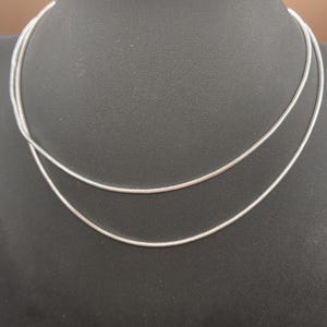 May include: A white ceramic mug with a black handle and the text "But First, Coffee" in a black, bold font. The mug is likely 11 ounces in size, perfect for a morning beverage.