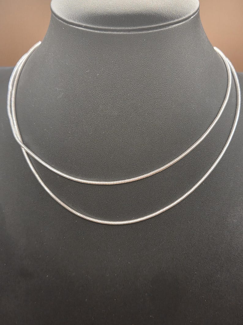 May include: A white ceramic mug with a black handle and the text "But First, Coffee" in a black, bold font. The mug is likely 11 ounces in size, perfect for a morning beverage.