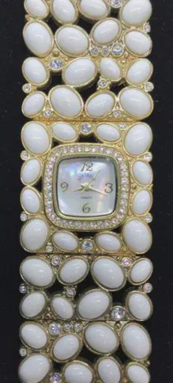 Adrienne Vittadini Watch/Bracelets. Mother of Pearl Face/ Rhinestones. R battery Vintage Adrienne Vittadini Bangle Watch: Mother of Pearl  main image 2