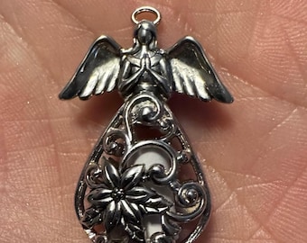 Silver Filigree Angel Diffuser Pendant Necklace: Magnetic Closure