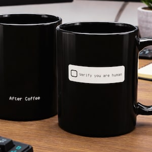 May include: A set of three ceramic nesting bowls in shades of blue, green, and white. The bowls feature a speckled glaze and a simple, modern design. The largest bowl is approximately 7 inches in diameter.