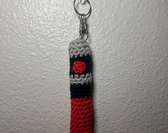 Red lightsaber crochet keychain