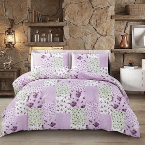 May include: A bedding set featuring a patchwork design with alternating squares of light purple, white, and green. The pattern includes floral motifs, small dots, and gingham checks. The set consists of a duvet cover and two matching pillow shams.