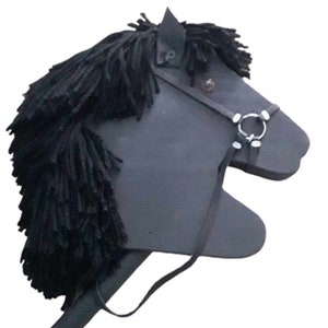 May include: A black wooden stick horse toy with a black mane and a leather bridle with a silver ring.