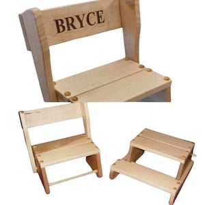 May include: A set of three wooden step stools, one with a back and the name "BRYCE" engraved on the back. The stools are made of light wood and have a natural finish.