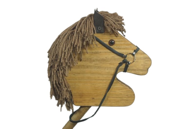 May include: Wooden toy horse head with brown yarn mane and black leather bridle. The horse has a brown wooden body and black eyes.